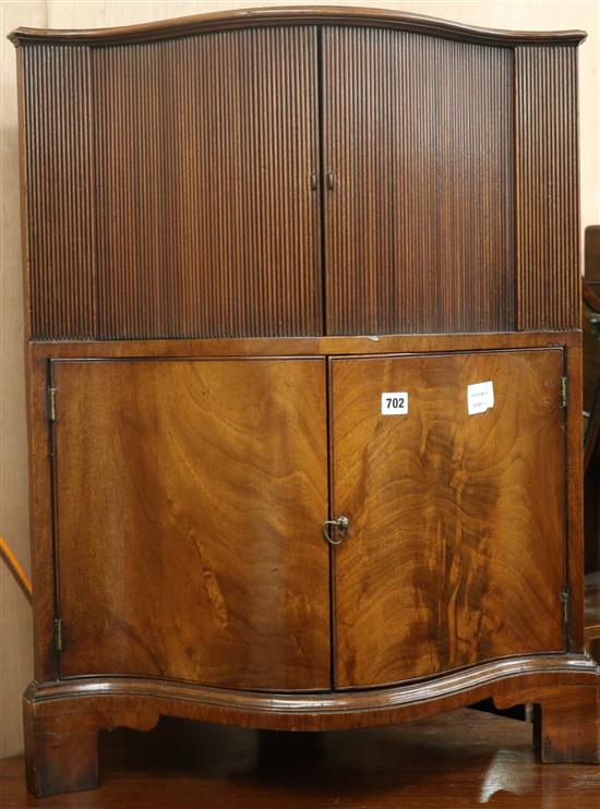 A George III mahogany serpentine corner cupboard, W.63cm